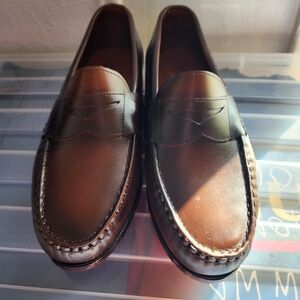 Allen Edmonds men's penny loafer dress shoes.